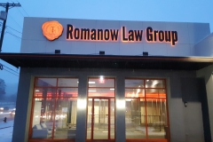 Romanow Law Reverse Lit Chanel Letters in Uniontown