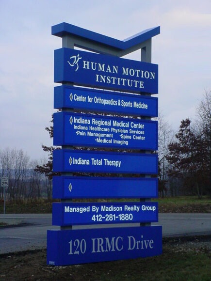 Blue Monument Signs with company information in Pittsburgh